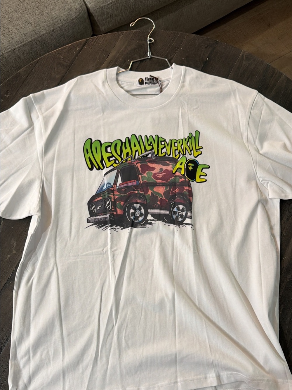 White Graphic Tee with Camouflage Van and Neon Green Lettering